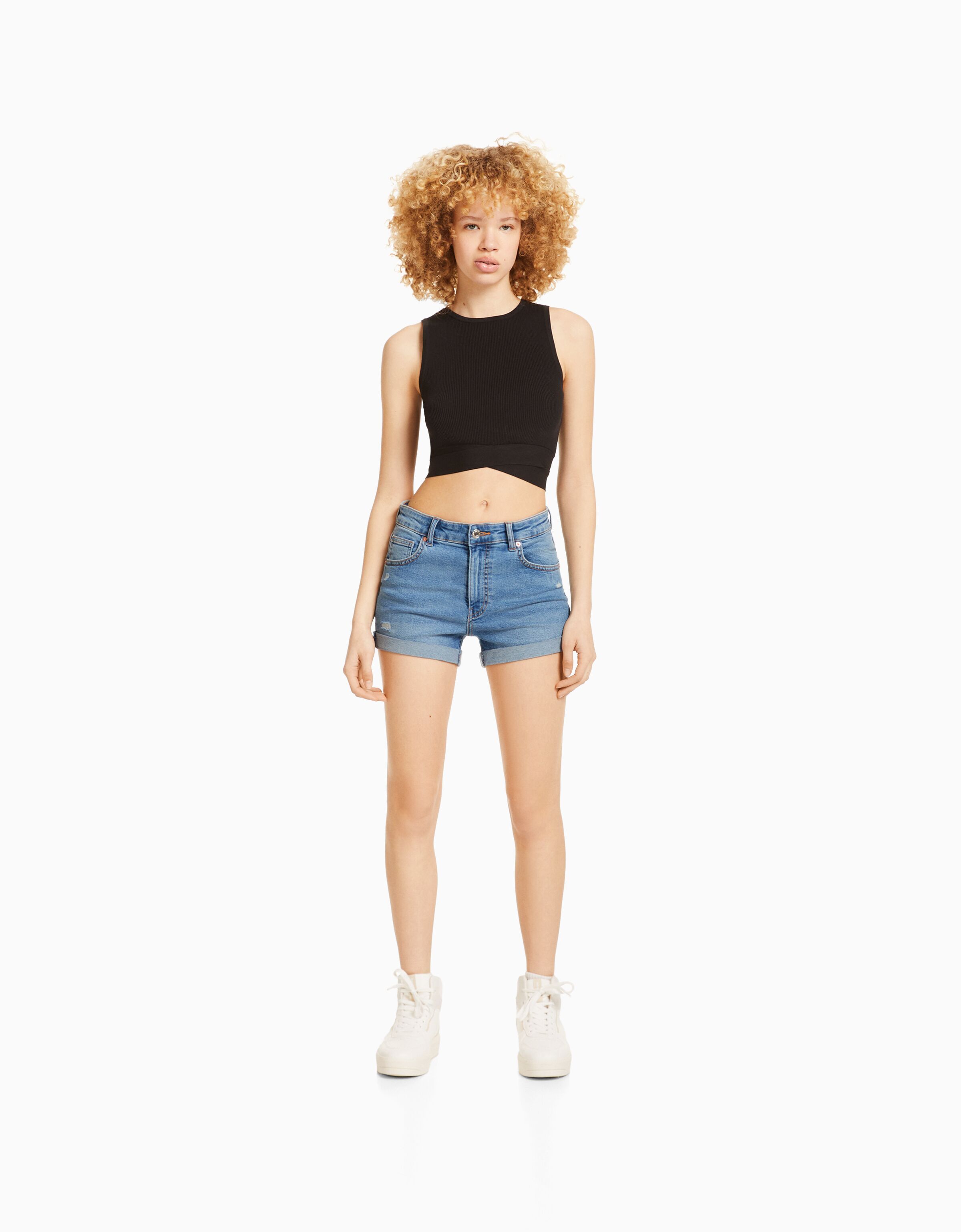 Roll up denim shorts Skirts and Shorts BSK Teen Bershka