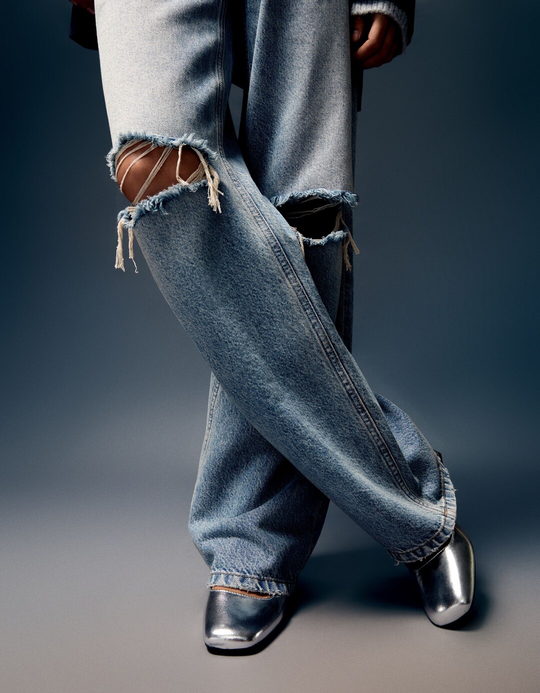 Wide leg 90's jeans met scheuren