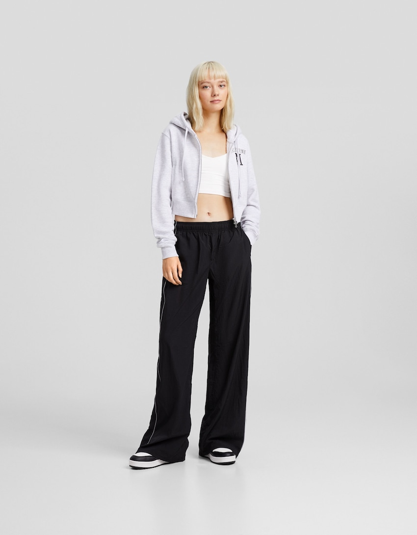 Wide-leg nylon trousers with detail