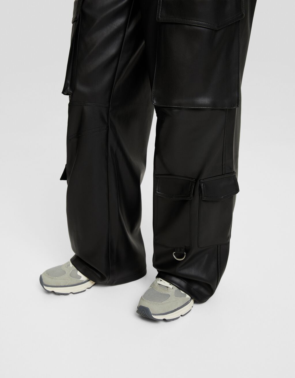 Leather effect multipocket cargo trousers Women Bershka