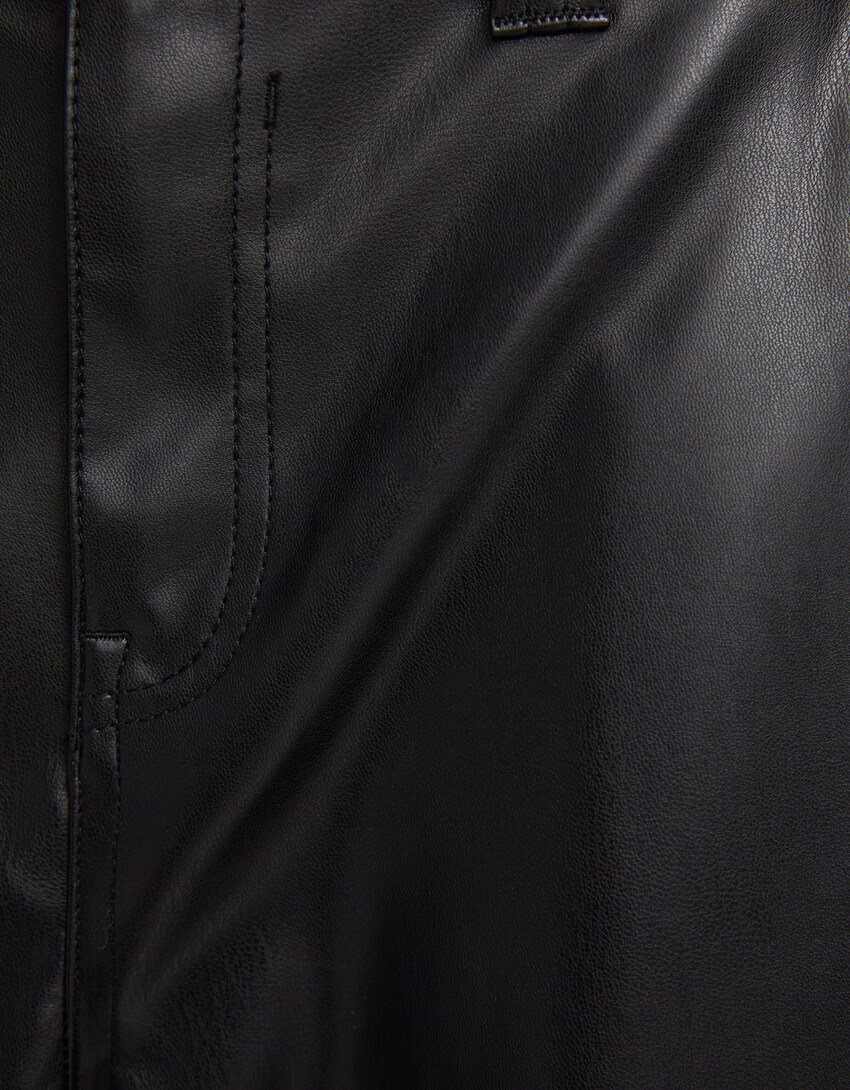 Leather effect multi-pocket cargo trousers - Women | Bershka