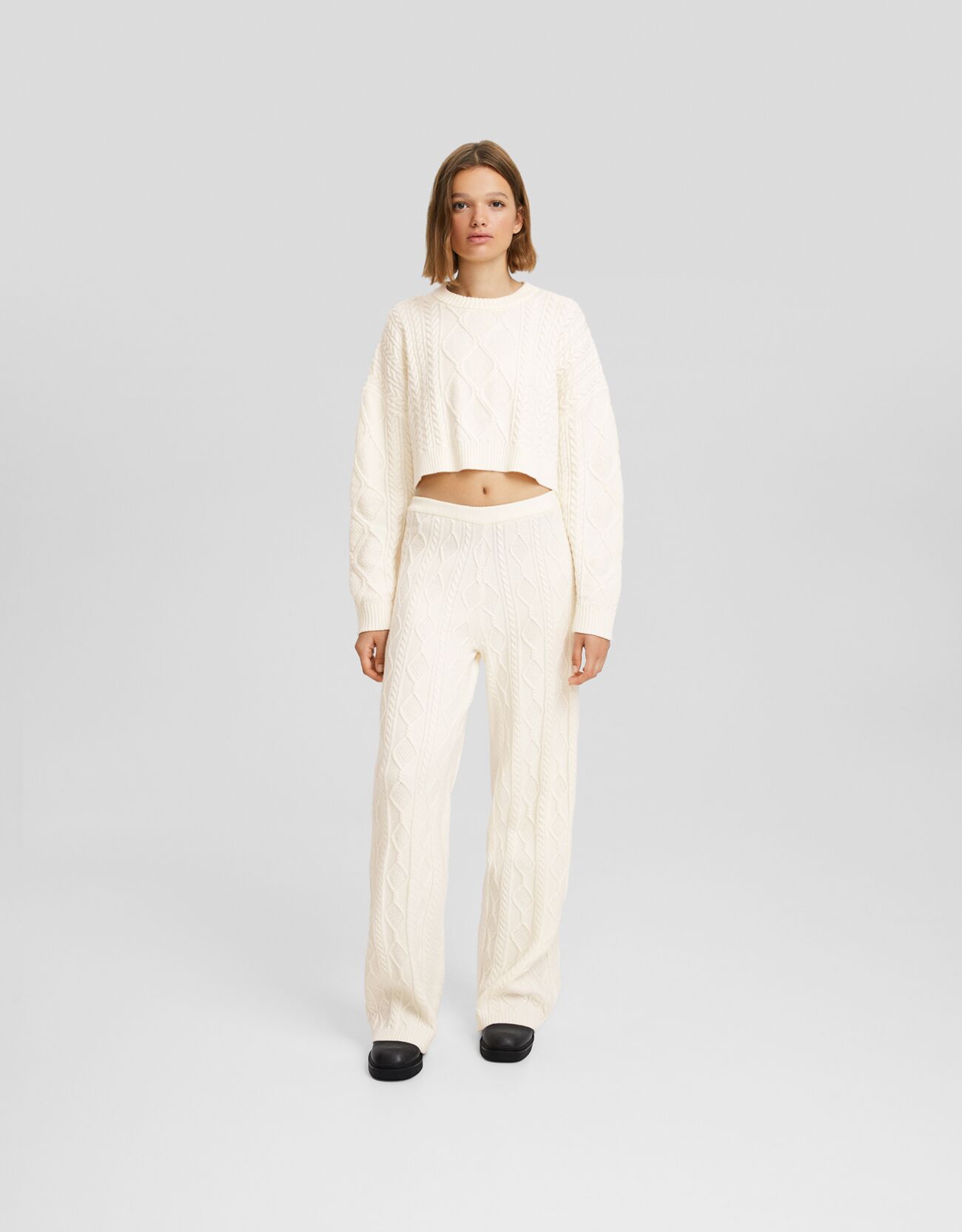 Pantaloni wide leg maglia trecce Donna Bershka