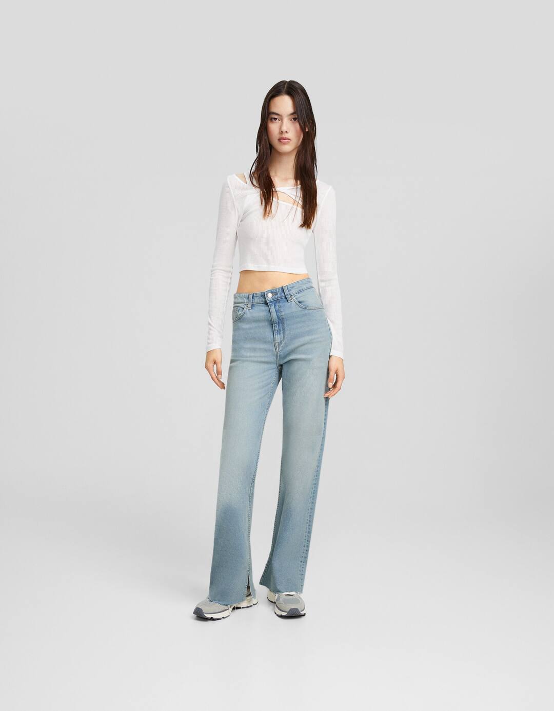 Jeans direitas conforto abertura lateral