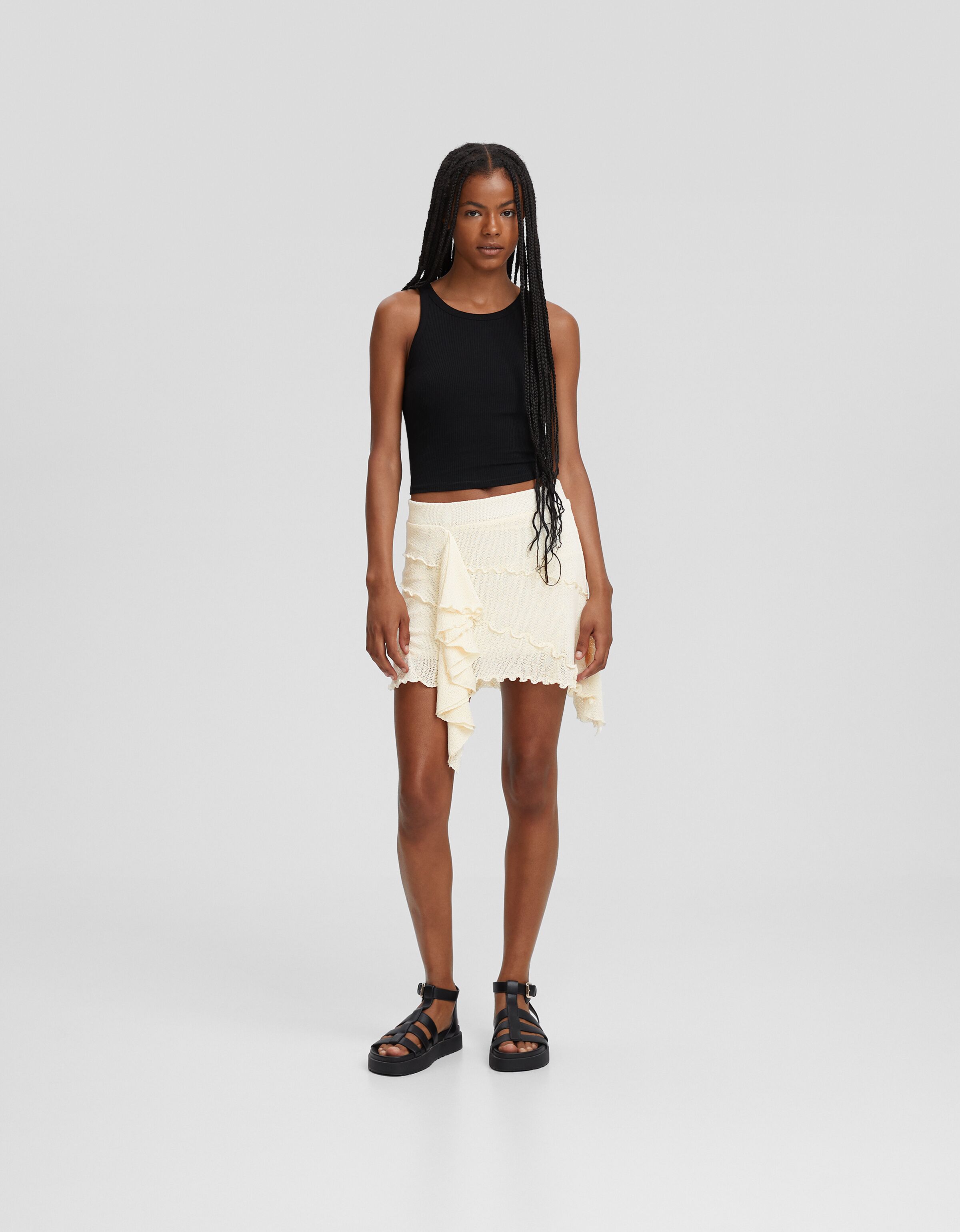 Black ruffle store wrap mini skirt