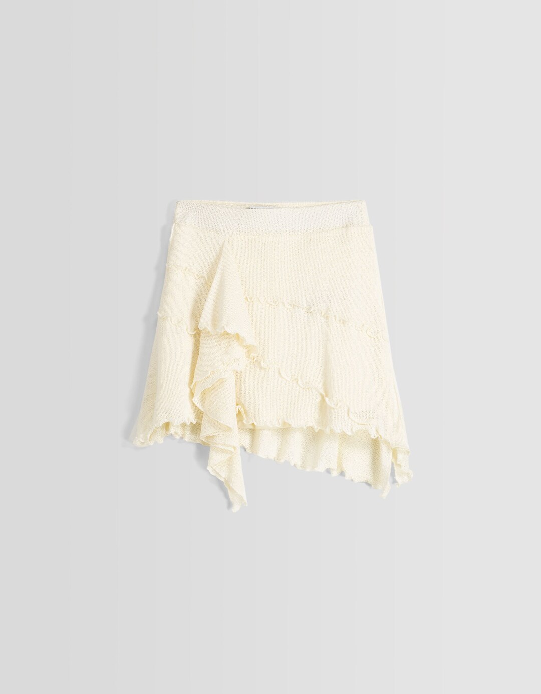 Asymmetric knit mini skirt