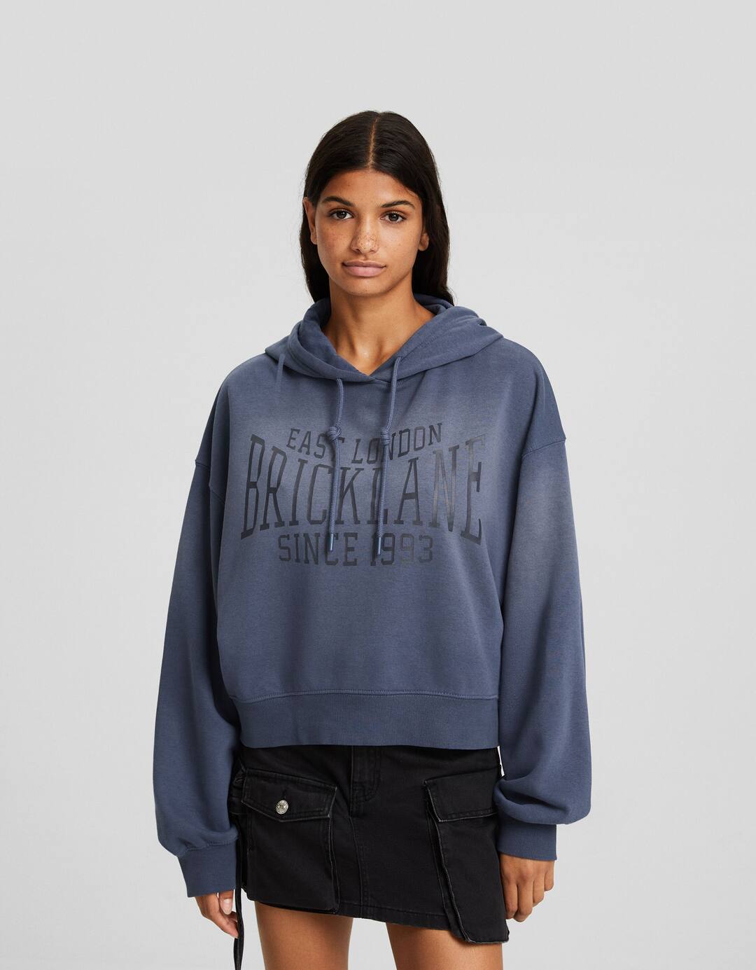 Oversize faded-effect slogan hoodie