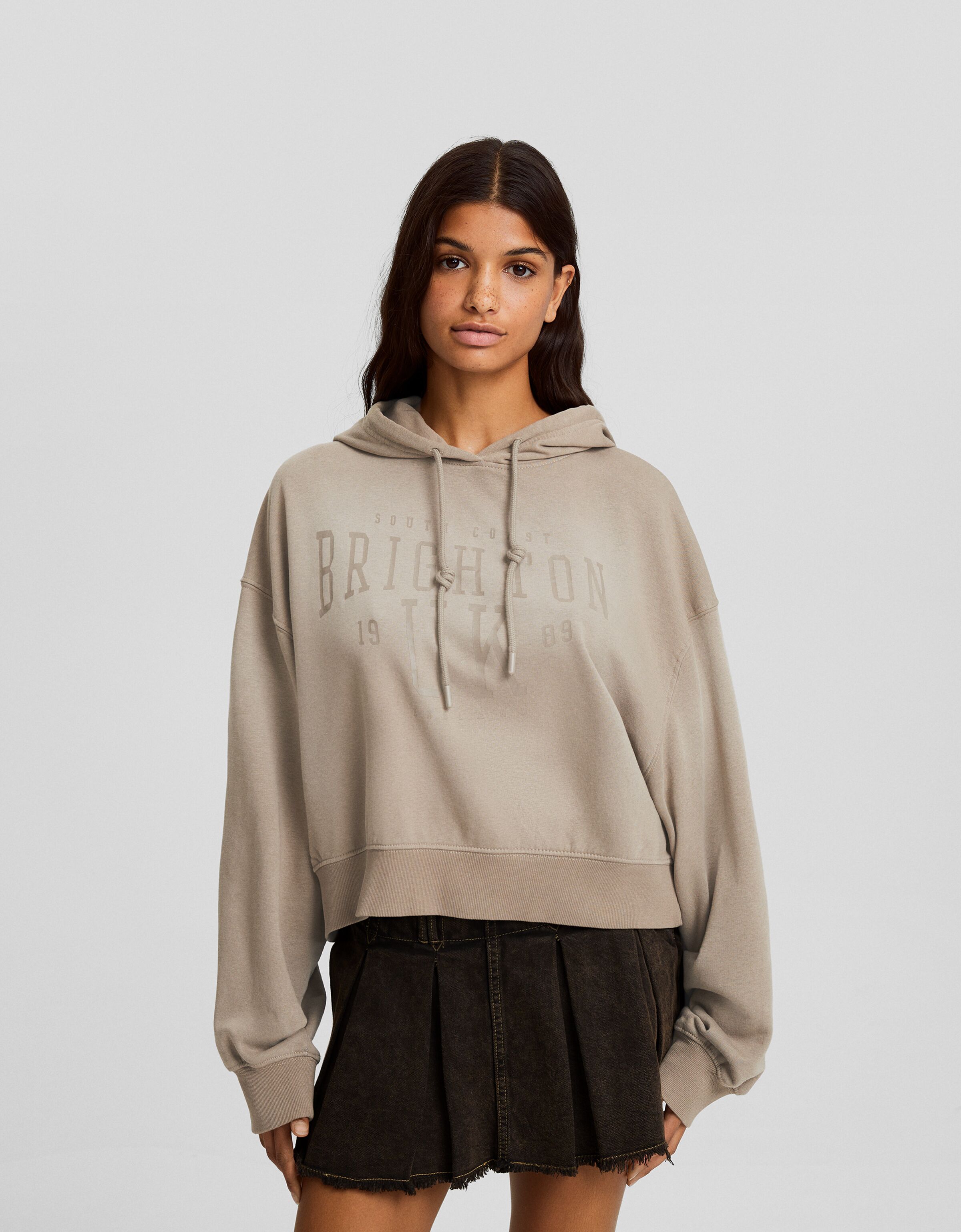 Sudadera capucha oversize efecto lavado texto New Mujer Bershka