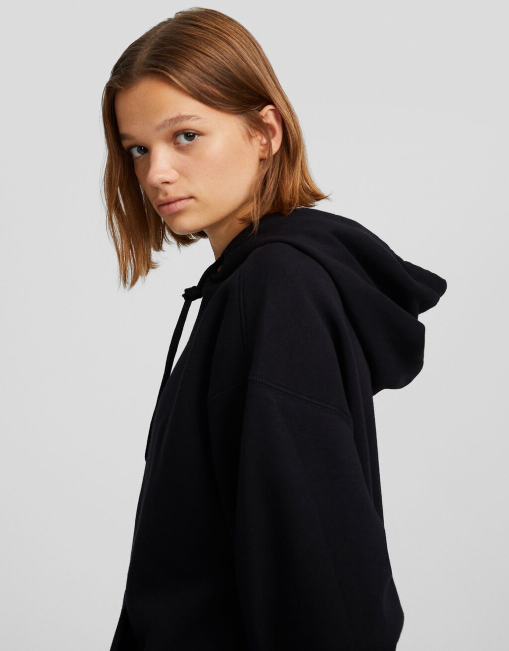 Oversize hoodie with pocket - Women | Bershka