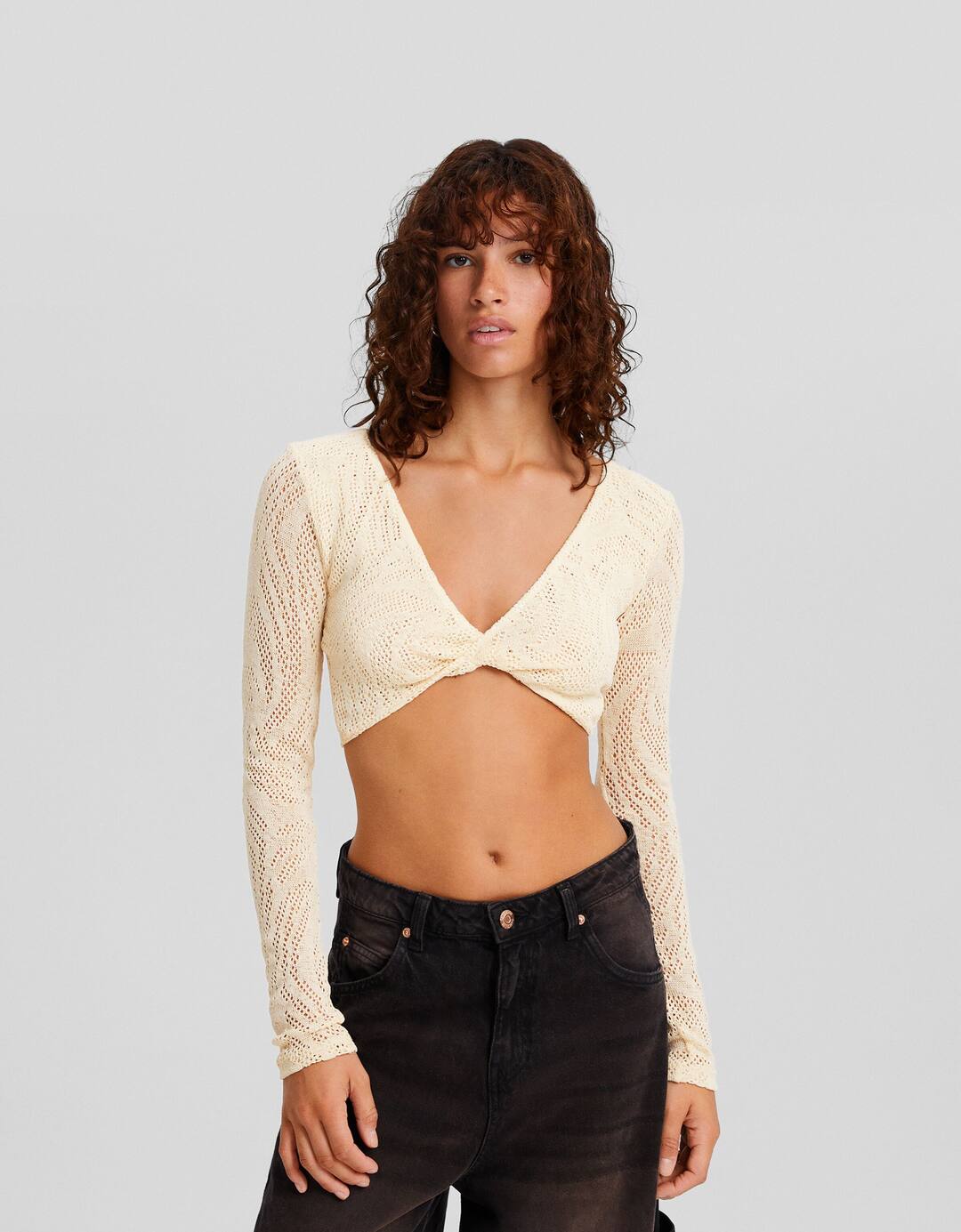 Cropped crochet knotted neckline sweater