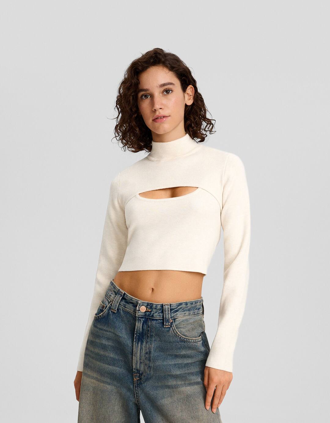 Cropped arm warmer sweater with a high neck