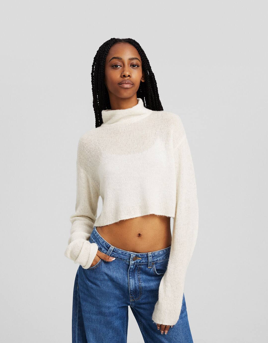Pull col roulé cropped transparent
