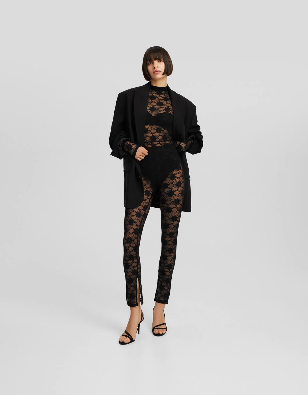 Lace jumpsuit with long sleeves and vents