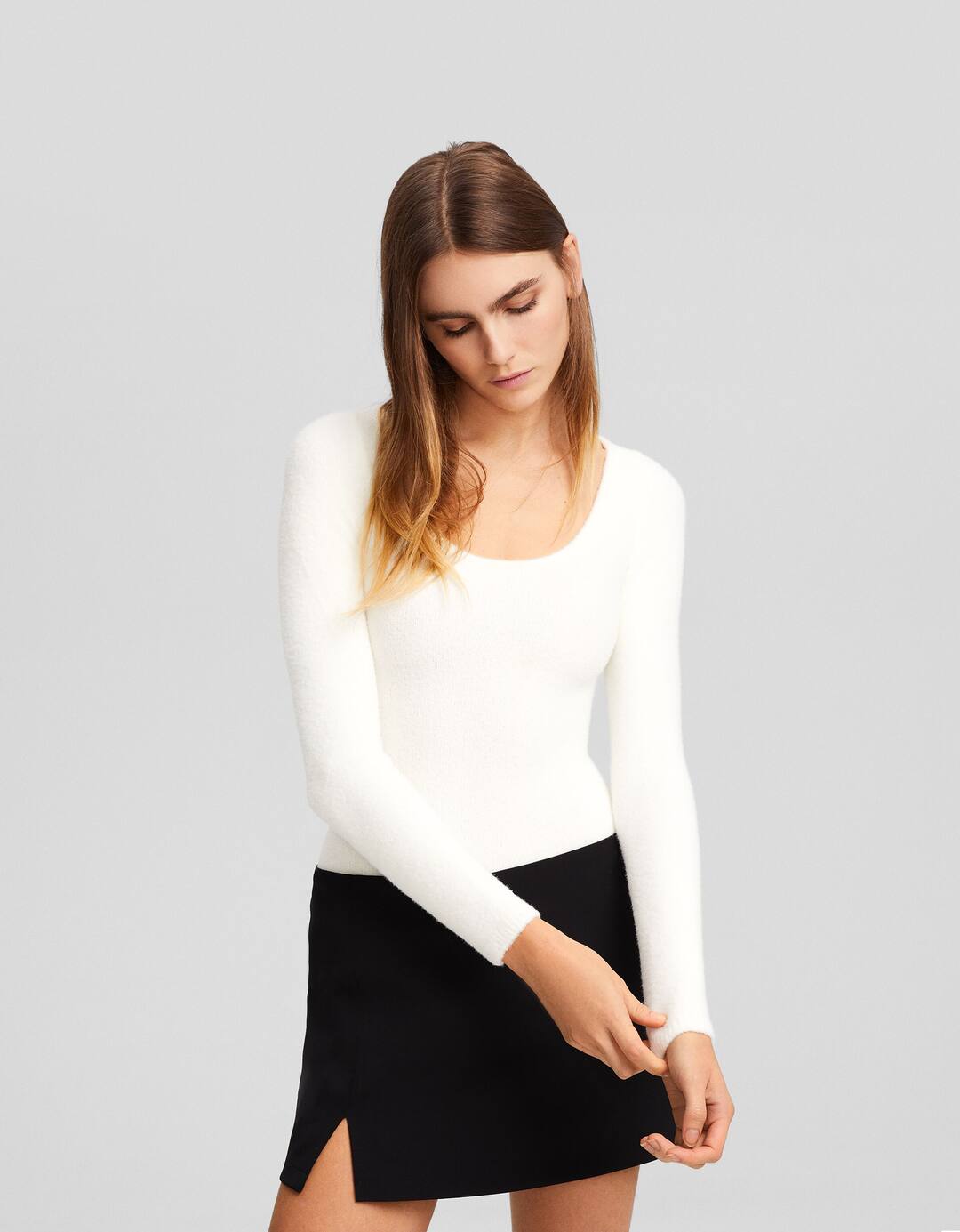 Long sleeve knit bodysuit with faux fur