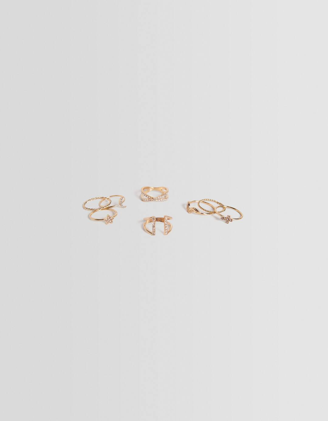 Set of 8 rhinestone moon cross rings