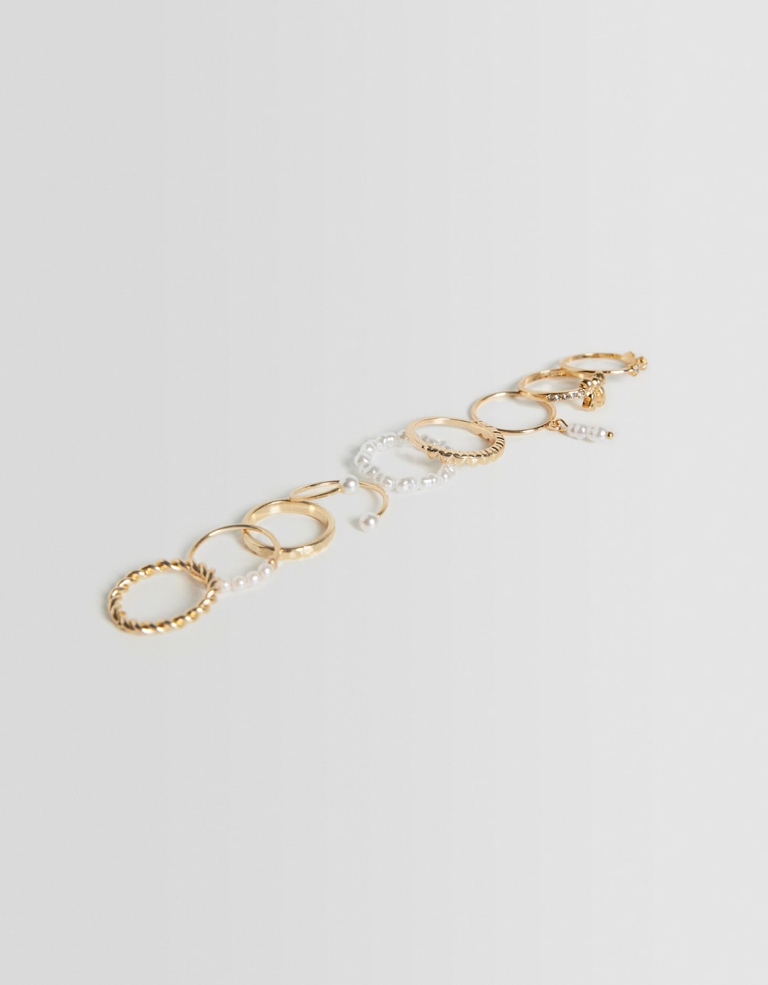 Set van 9 ringen met hart van kunstparel