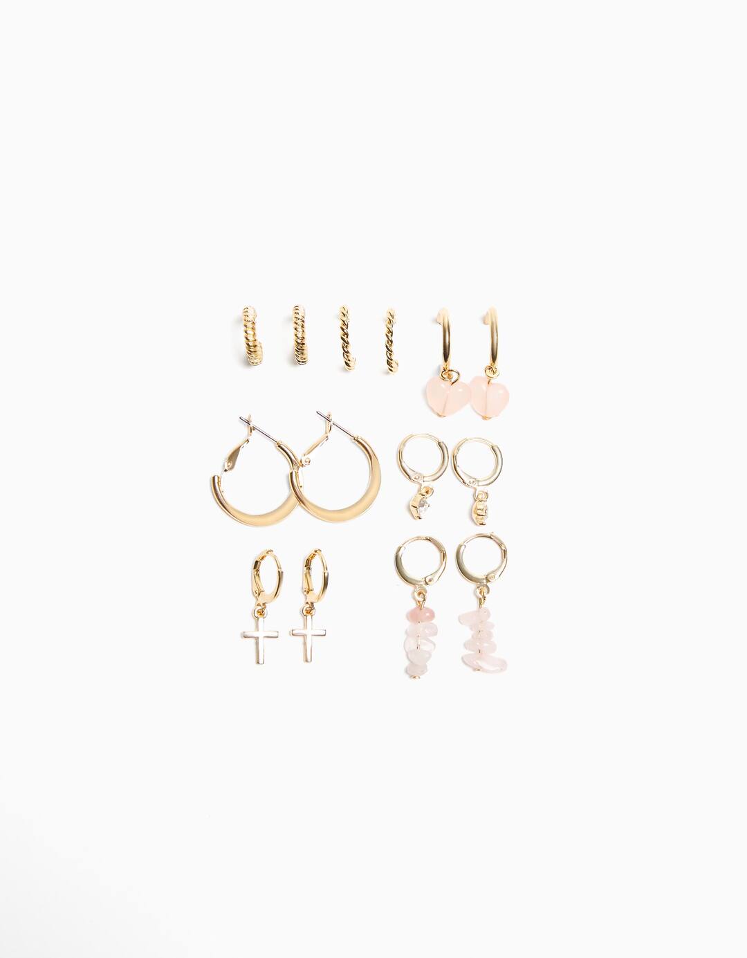 Set of 7 pairs of rhinestone, cross and charm earrings