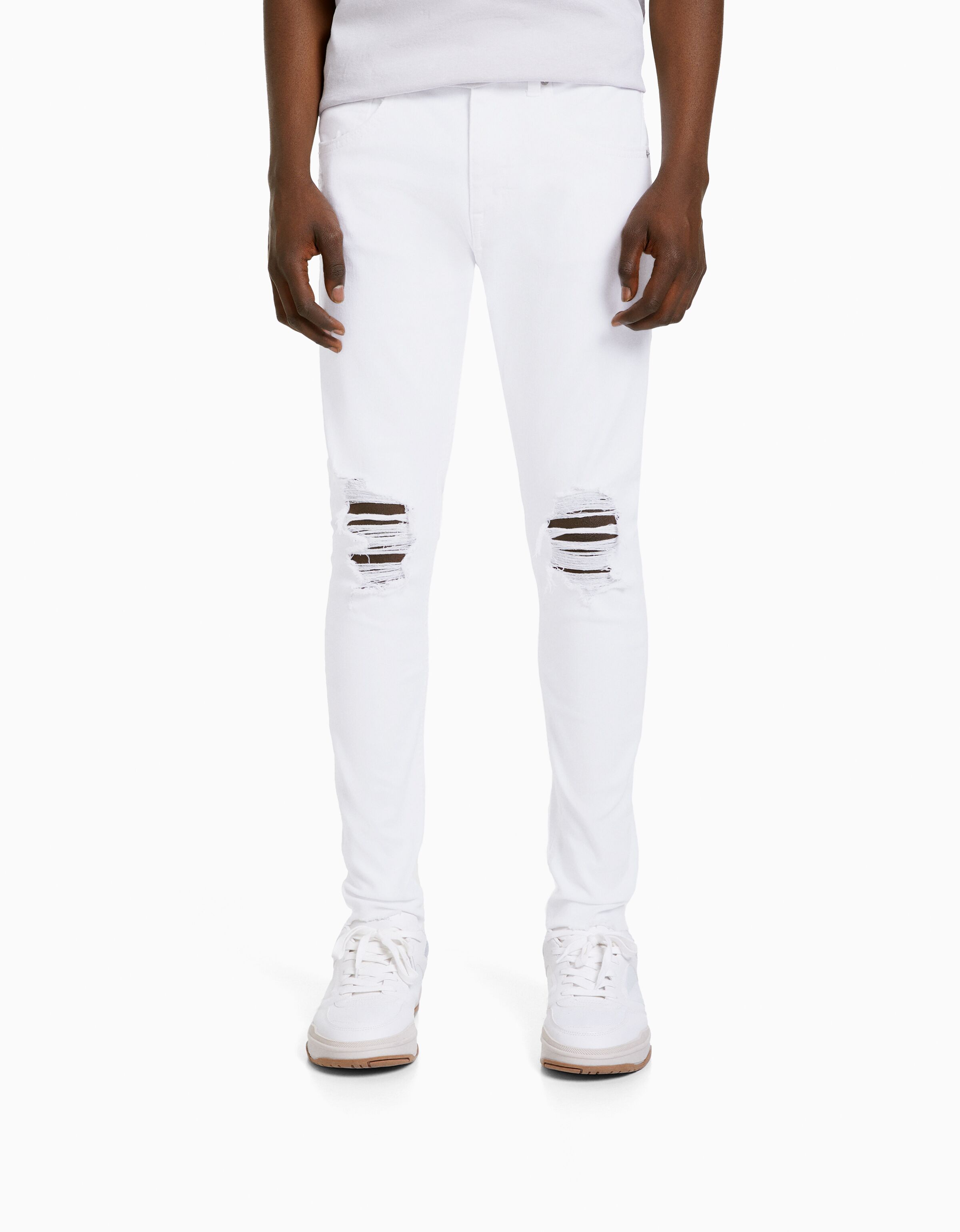 Jeans blancos best sale rotos hombre