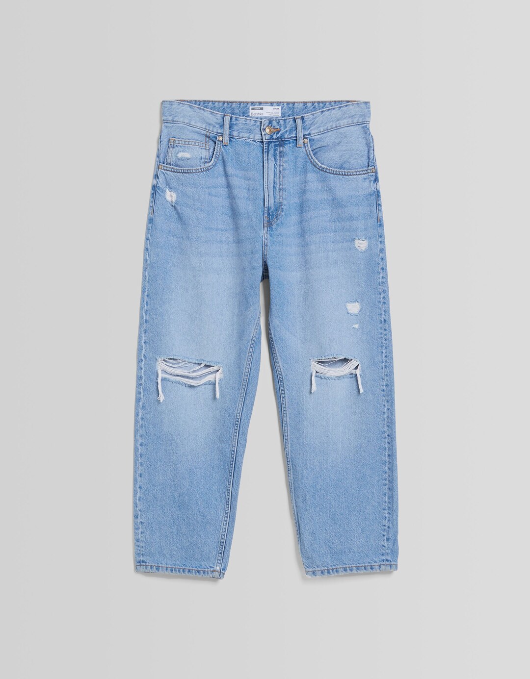 Loose fit jeans with rips