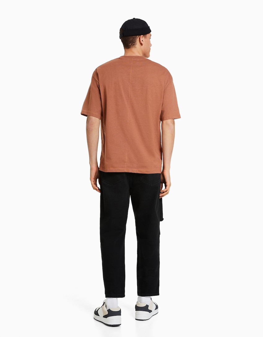 Loose fit jeans with rips - Men | Bershka