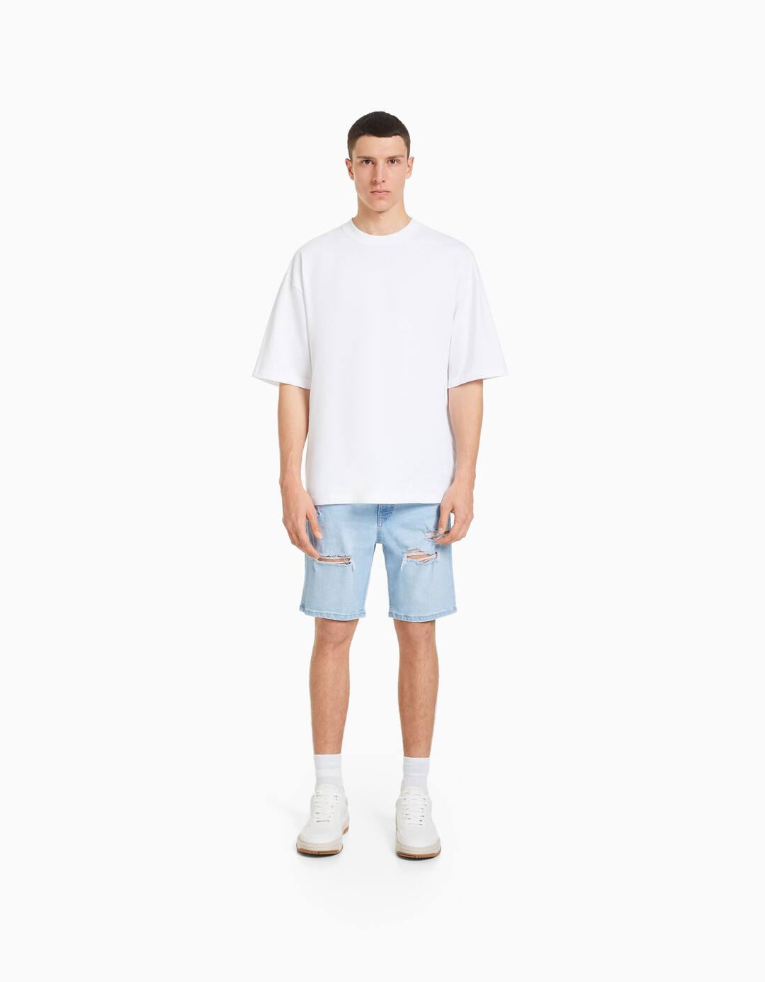 Ripped denim Bermuda shorts