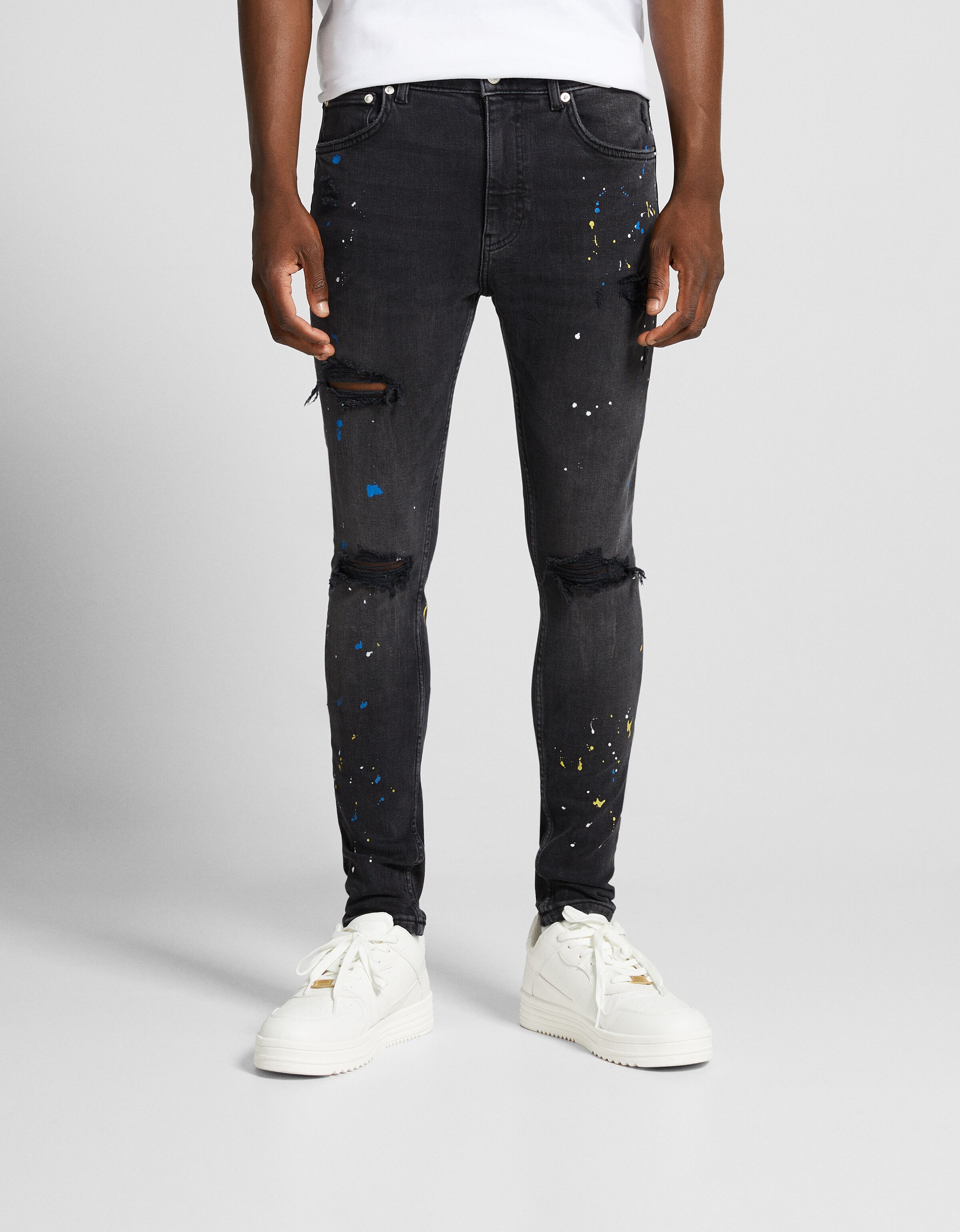 Ripped super skinny jeans with paint splatter Men Bershka