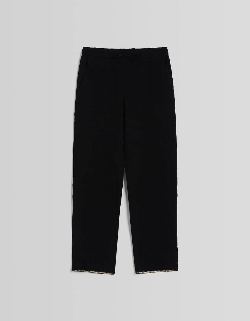 Rustic trousers with embroidered detail-Black-4