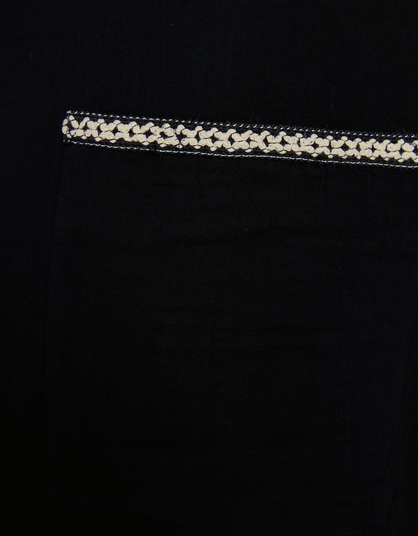 Rustic trousers with embroidered detail-Black-5