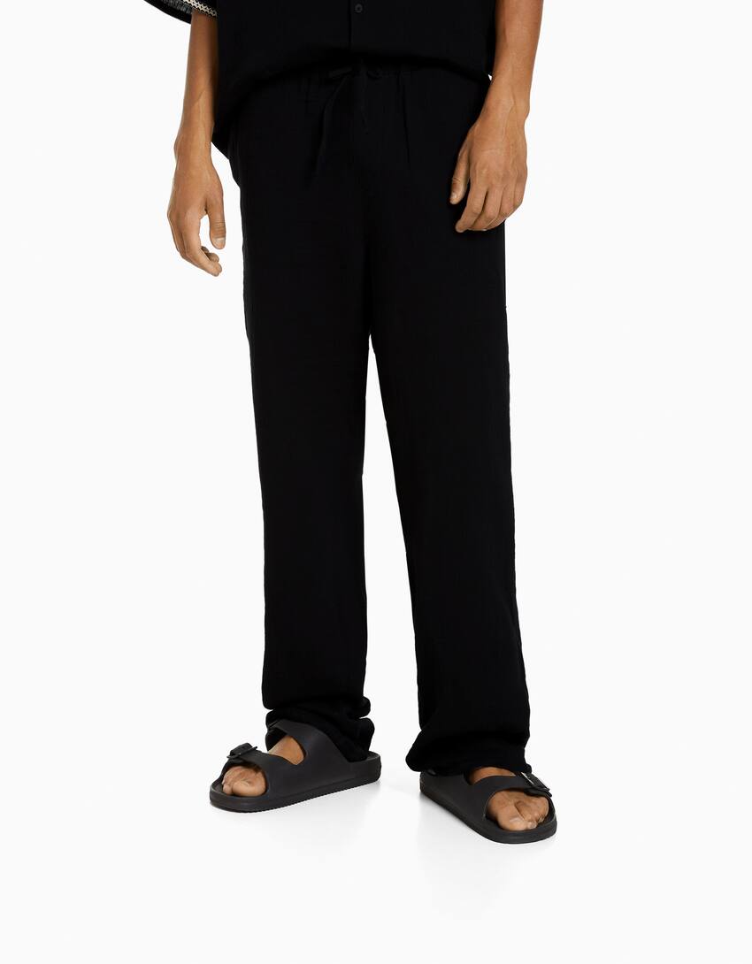 Rustic trousers with embroidered detail-Black-2