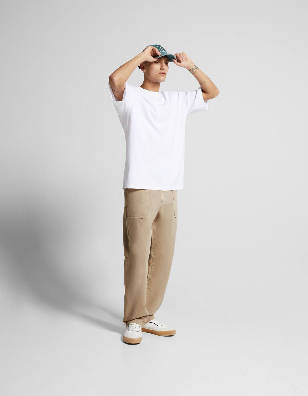 Cotton trousers with front pocket detail