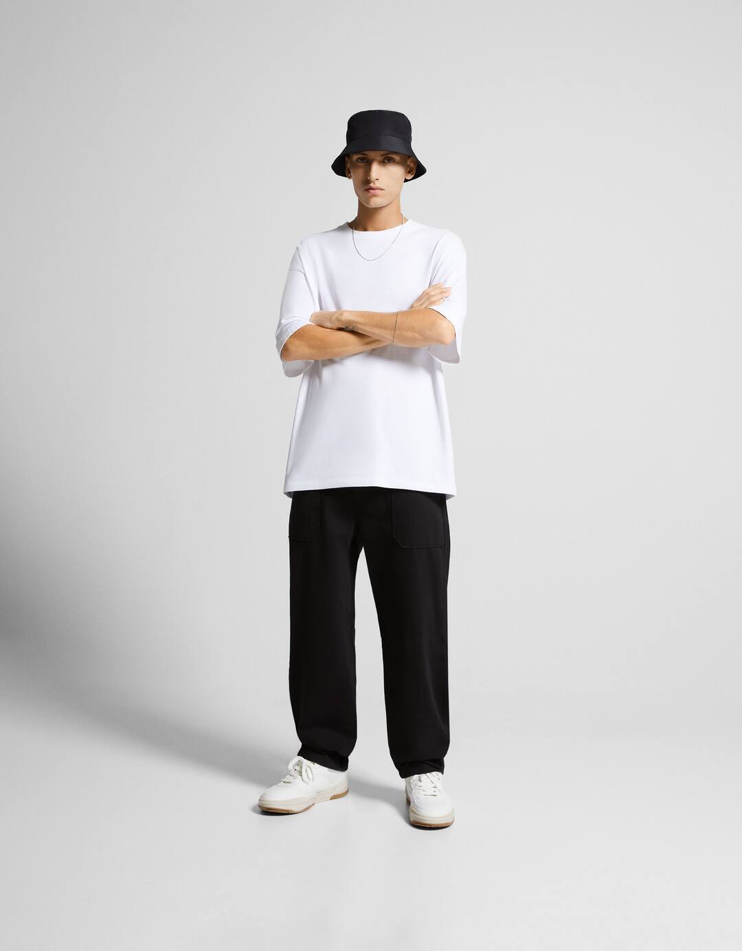 Cotton trousers with front pocket detail
