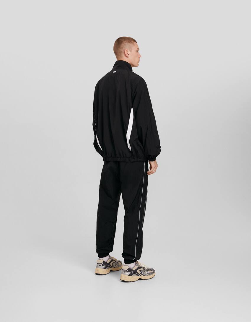 Technical jogging trousers with reflective detail-Black-2