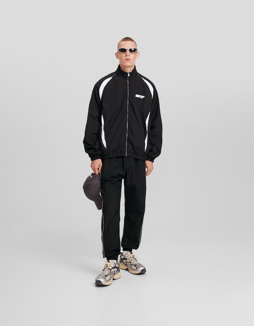 Technical jogging trousers with reflective detail-Black-0