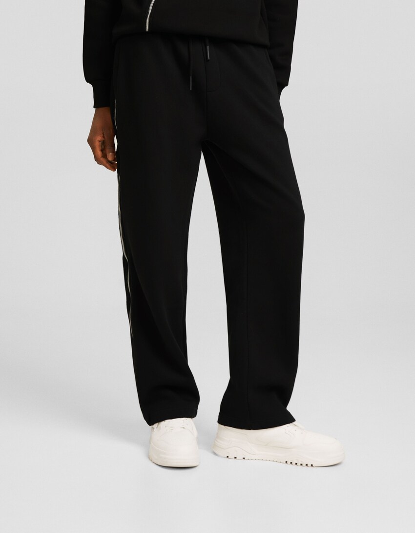 Wide-leg plush trousers with zips - Men | Bershka