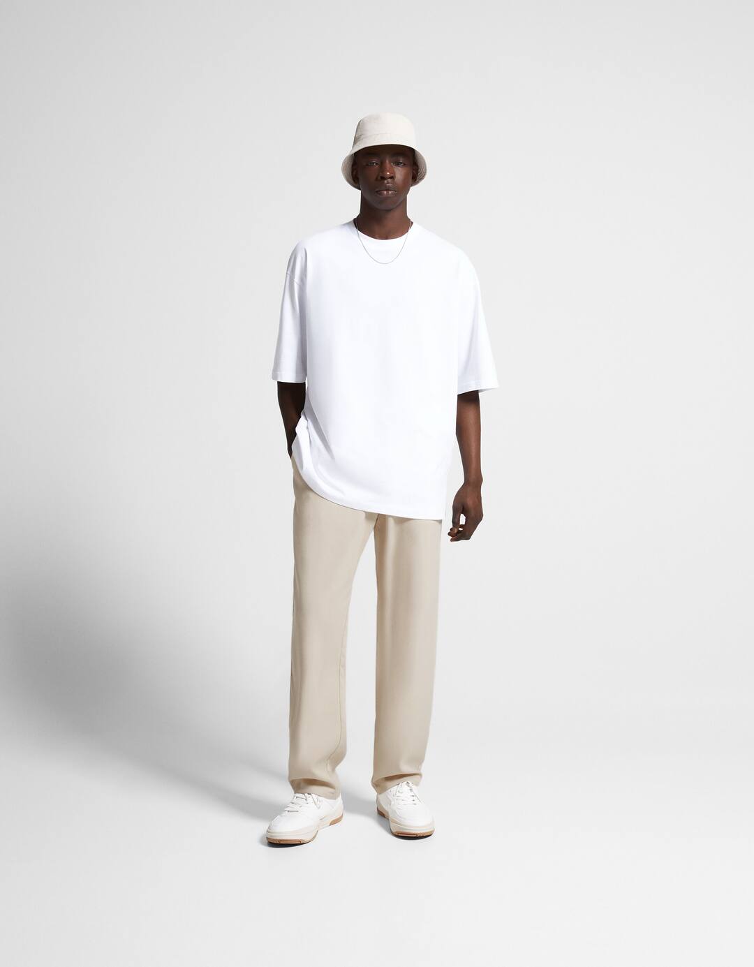 Tailored trousers with darts