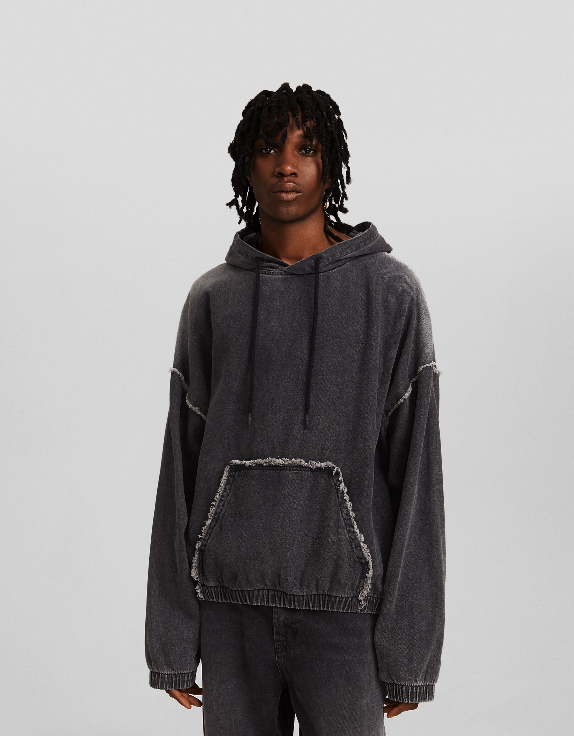 Faded-effect boxy fit denim hoodie - Men | Bershka