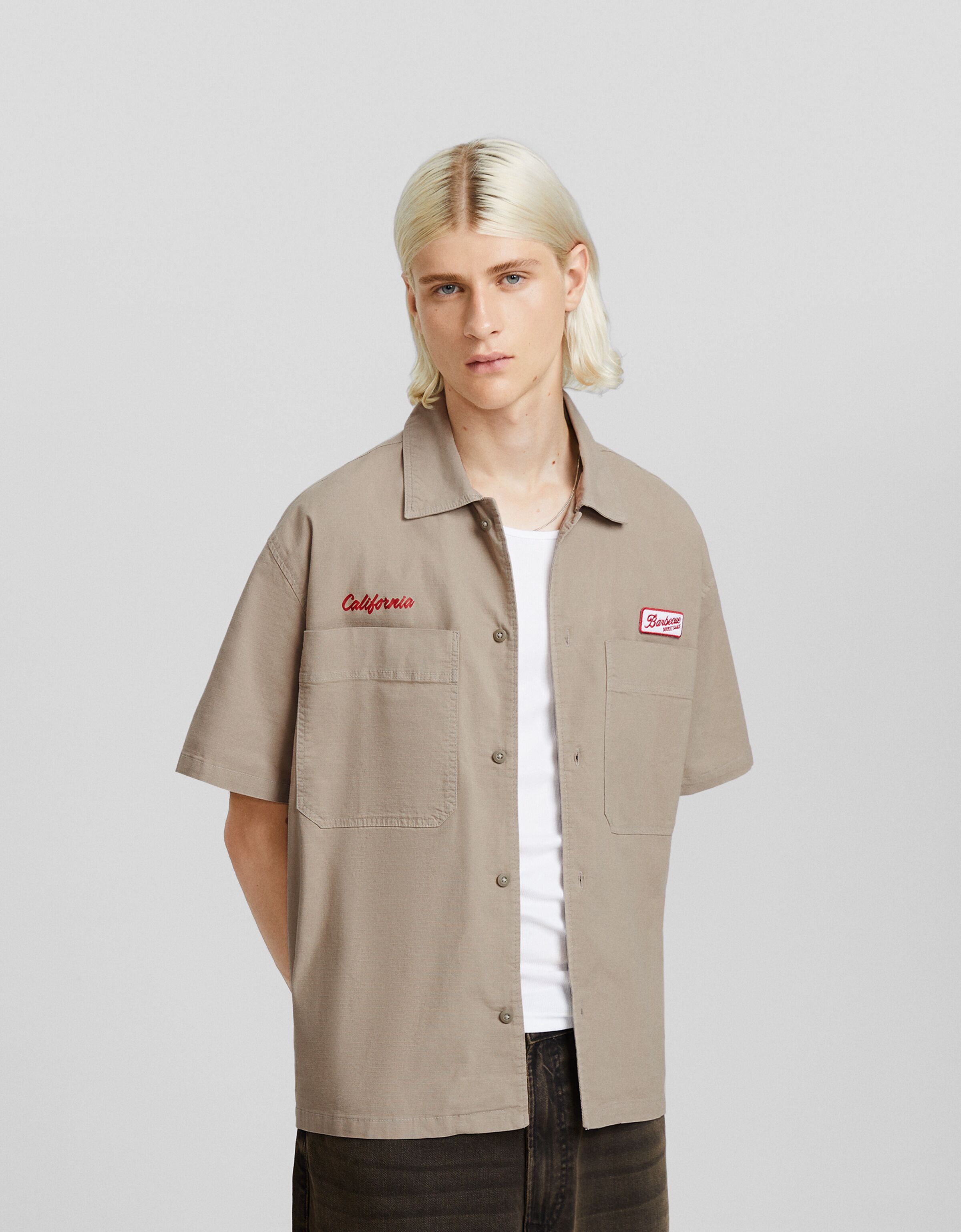 Short sleeve workwear shirt with patches - Men | Bershka