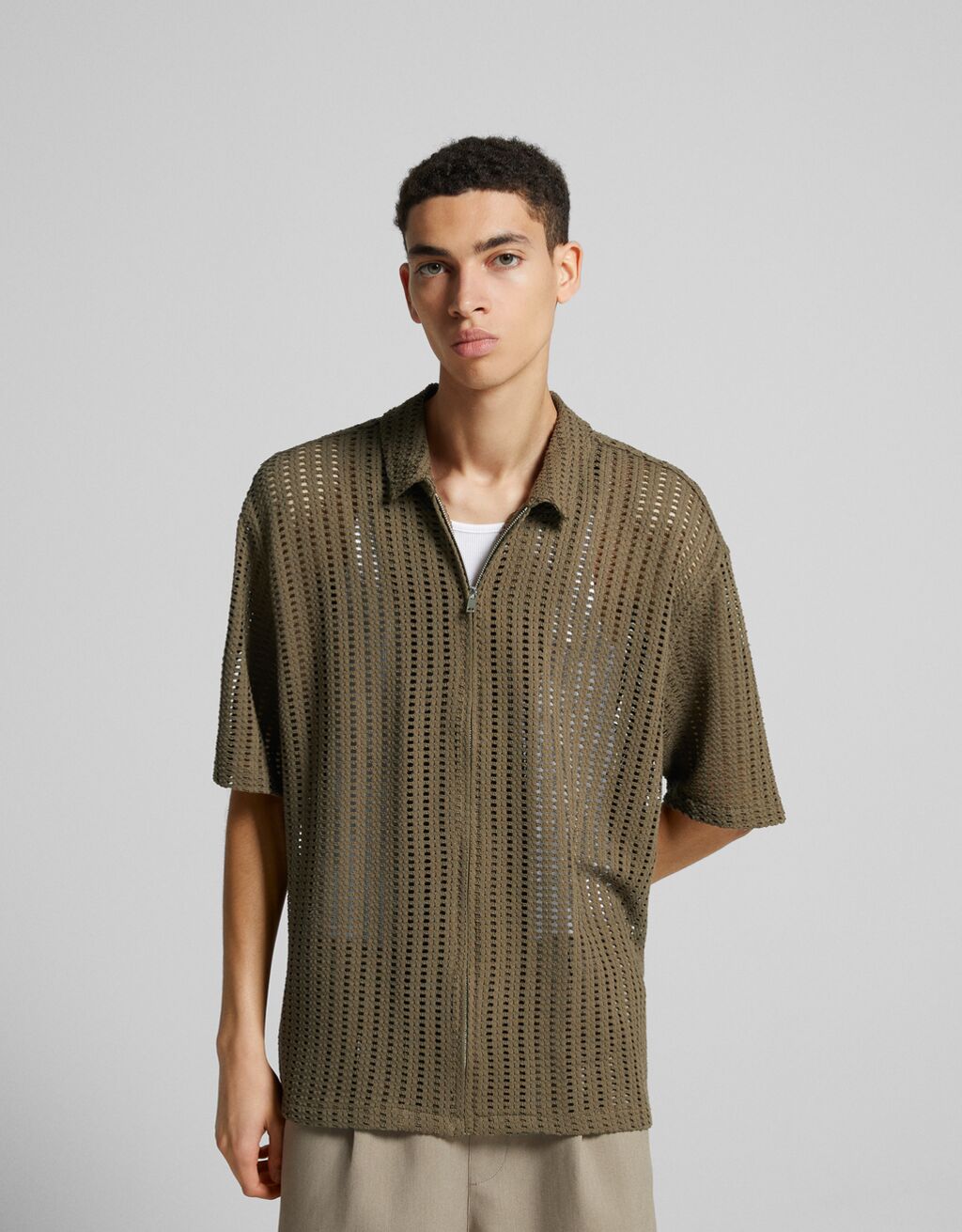 Rustic short sleeve shirt with zipper - Men | Bershka