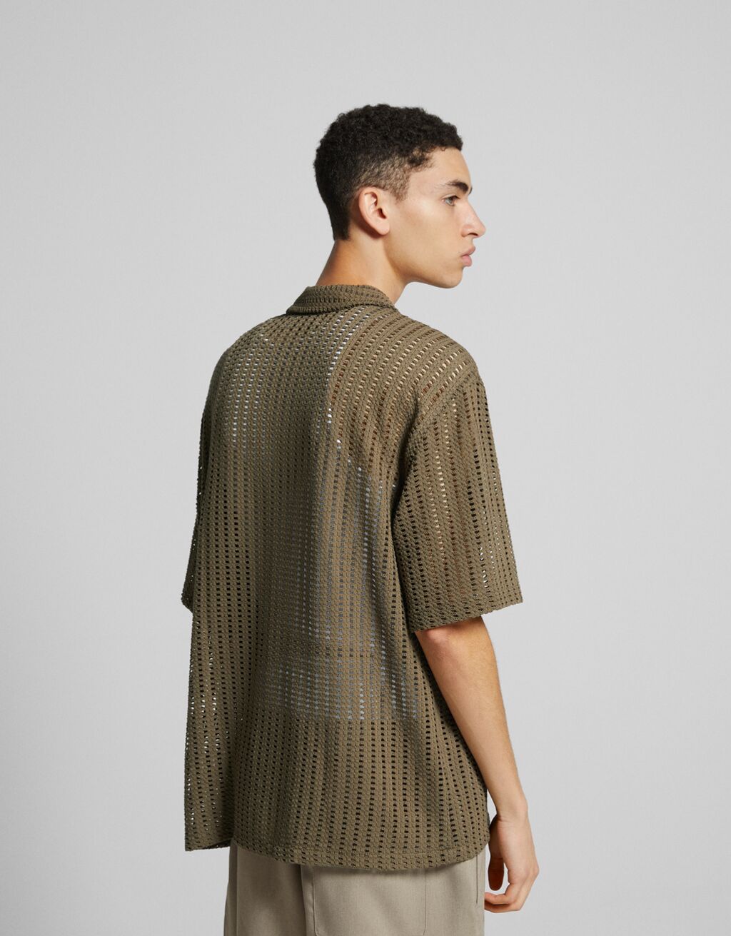 Rustic short sleeve shirt with zipper - Men | Bershka