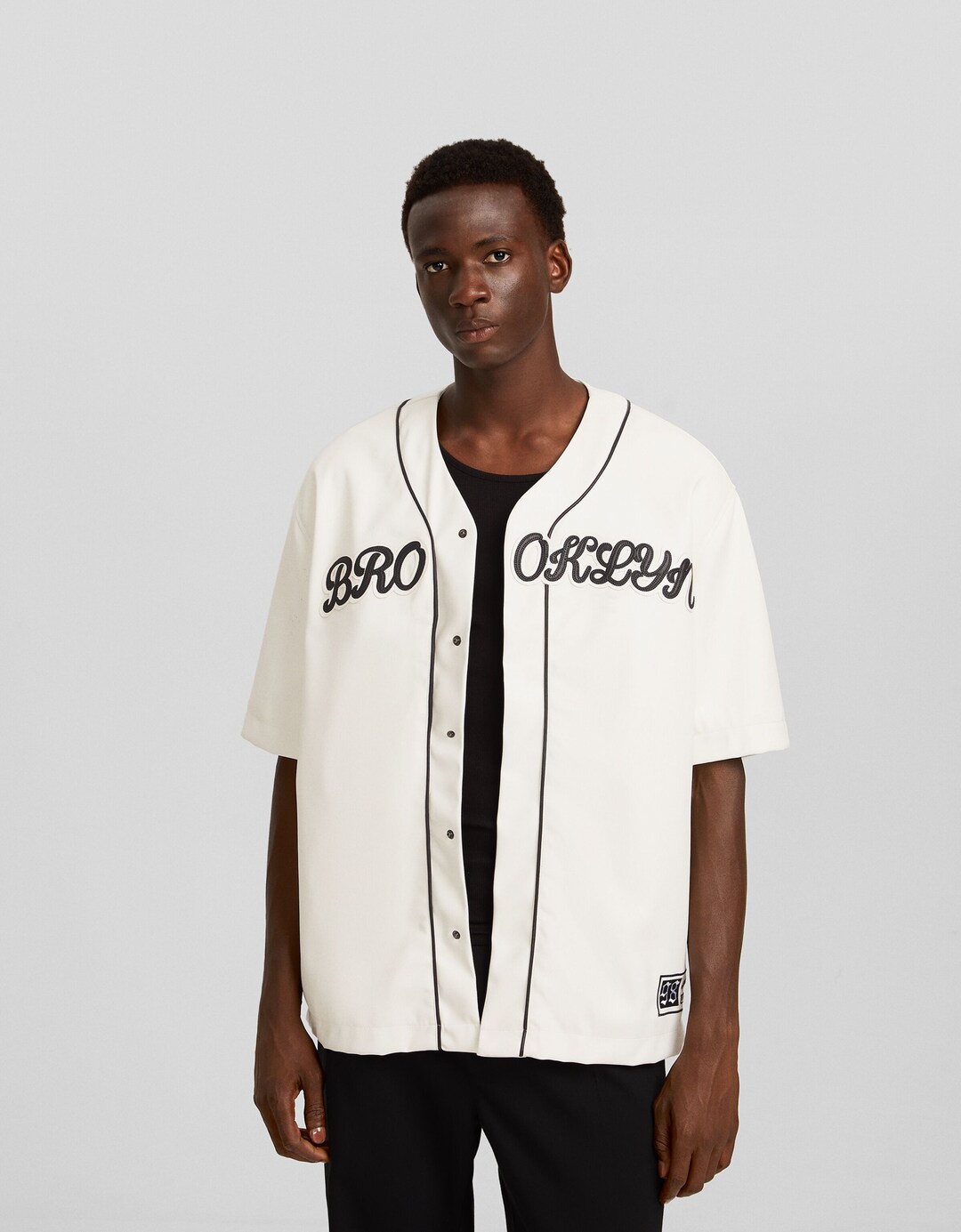 Camisa màniga curta beisbolera efecte pell