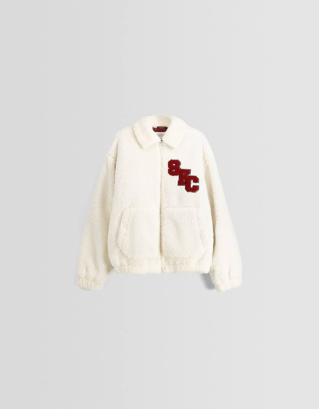Faux shearling jacket with patches