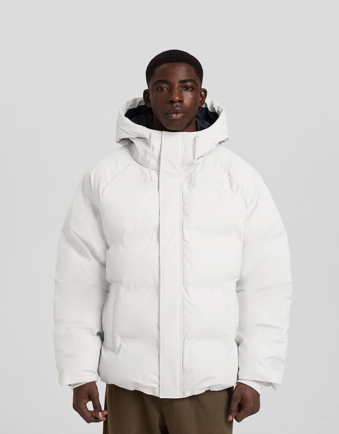 Technical thermo-sealed puffer coat