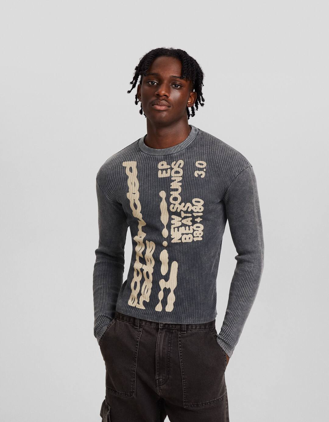 Ribbed sweater with a faded effect and print