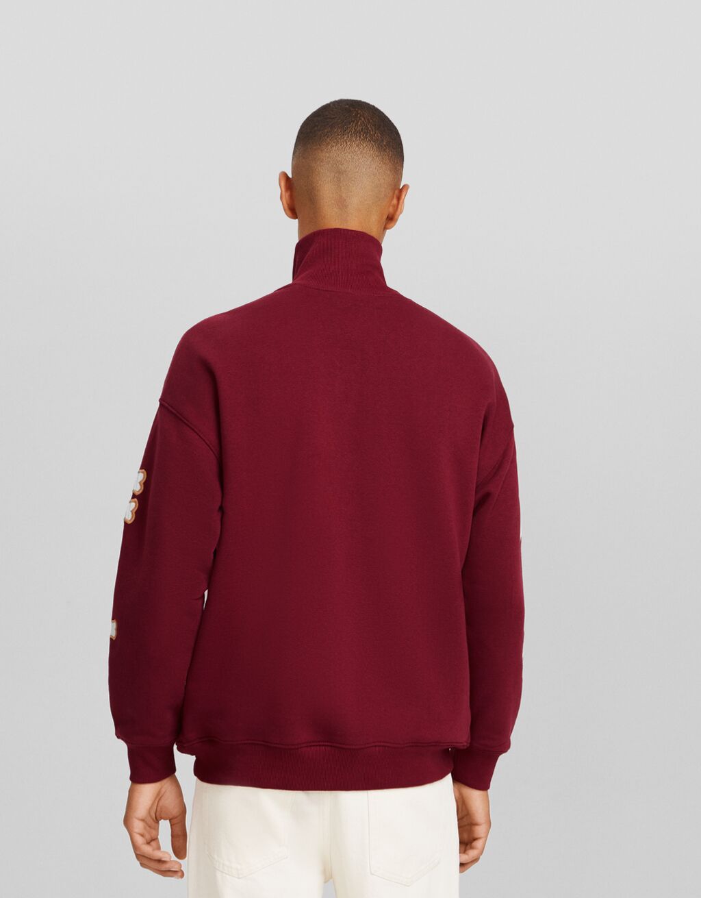High neck zip up sweatshirt with patches Men Bershka