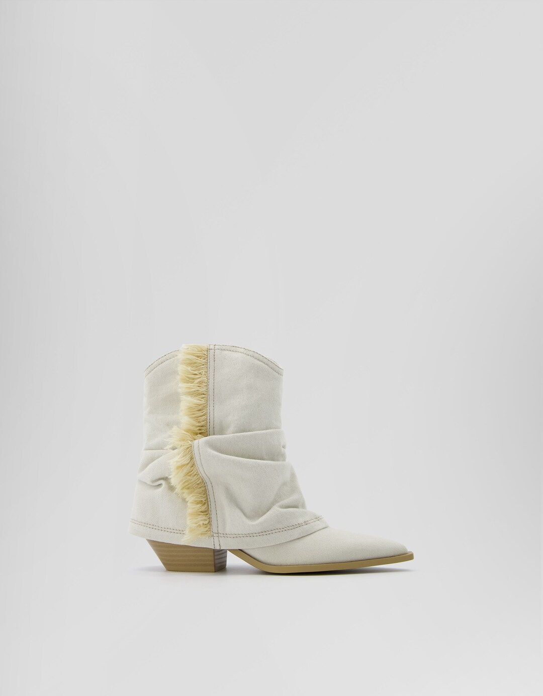 Cowboy ankle boots with fringing
