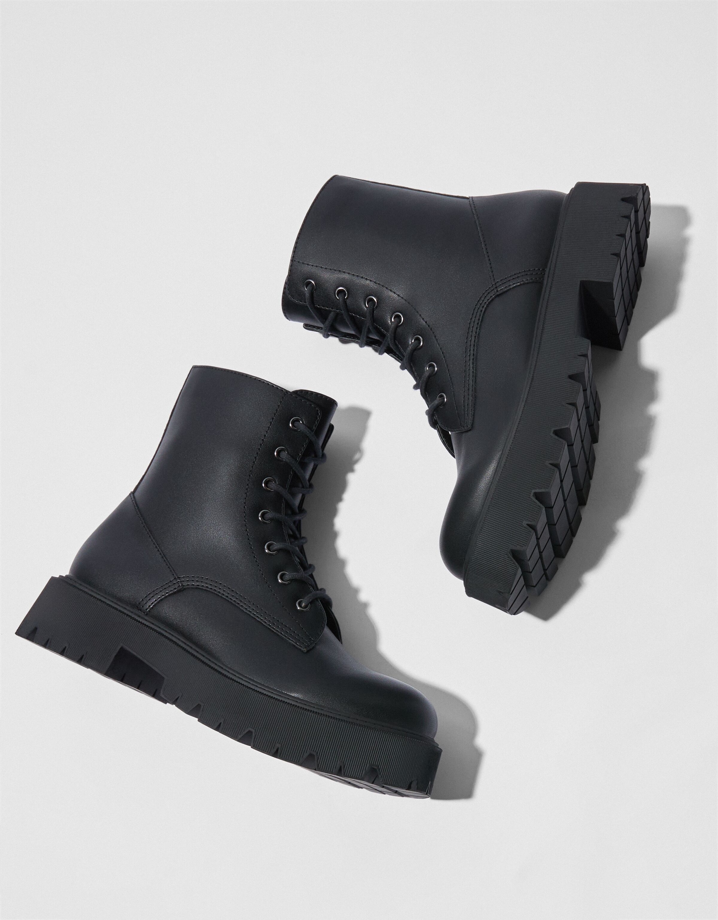 Lace up flat ankle boots