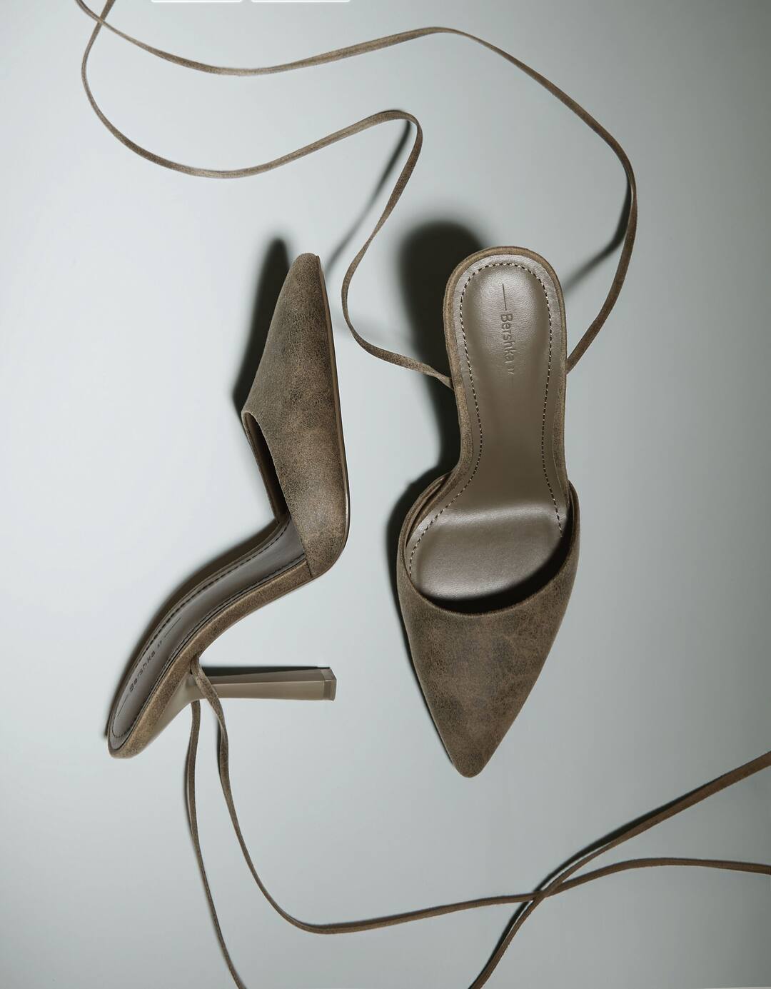 Tied high heel slingback shoes