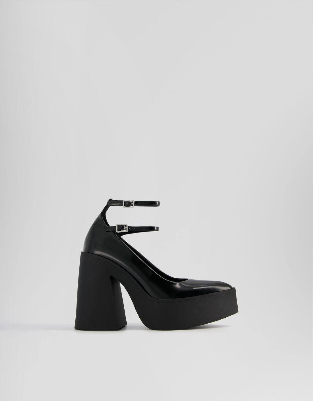 High-heel platform shoes with pointed toe and ankle strap