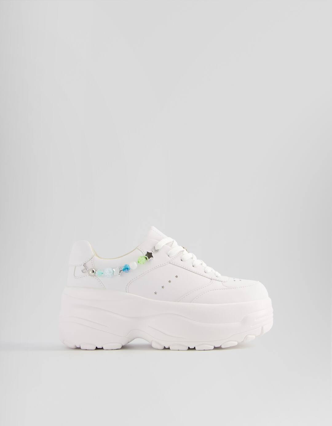 Chunky sole trainers with beaded chain
