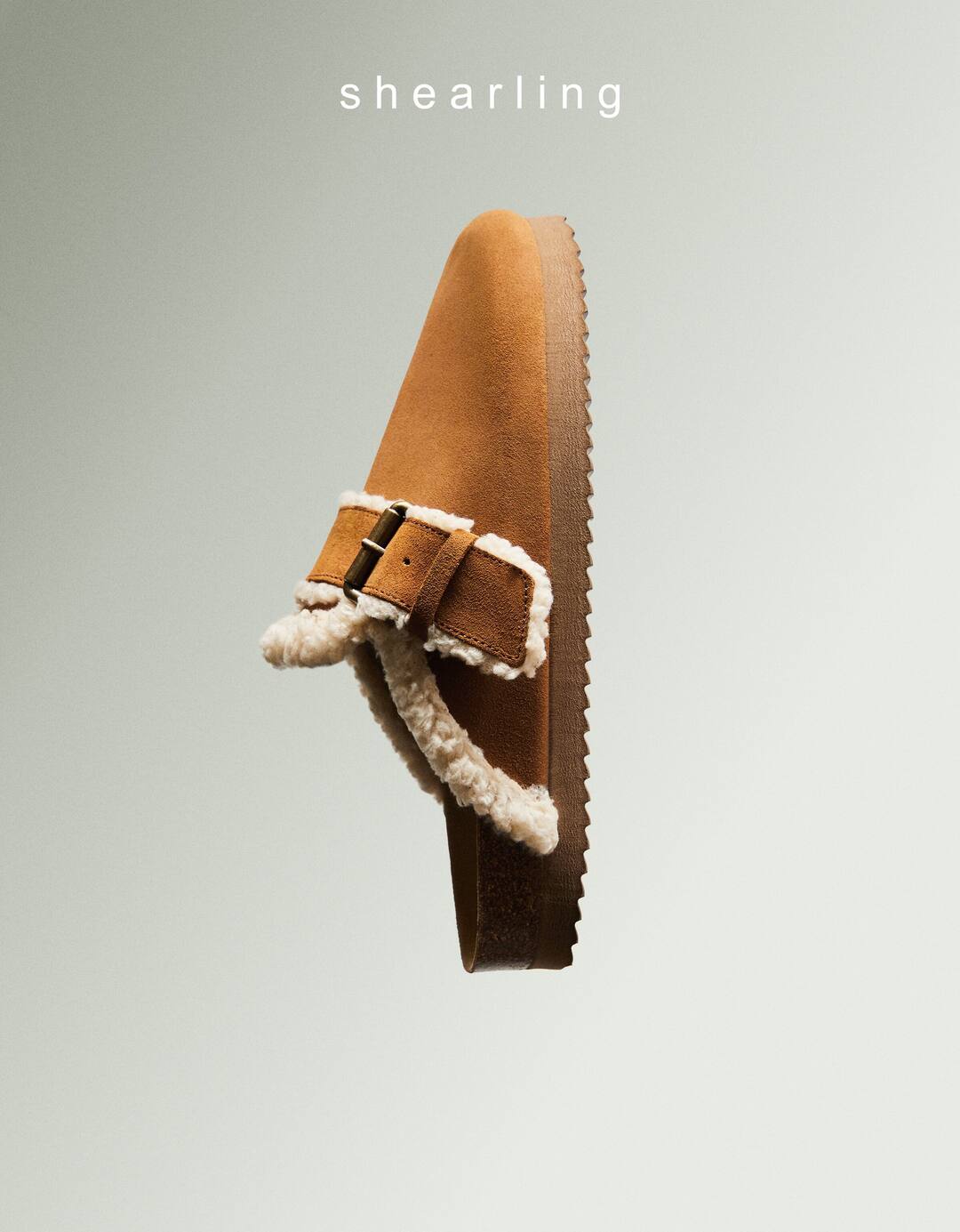 LEATHER faux shearling clogs with buckle