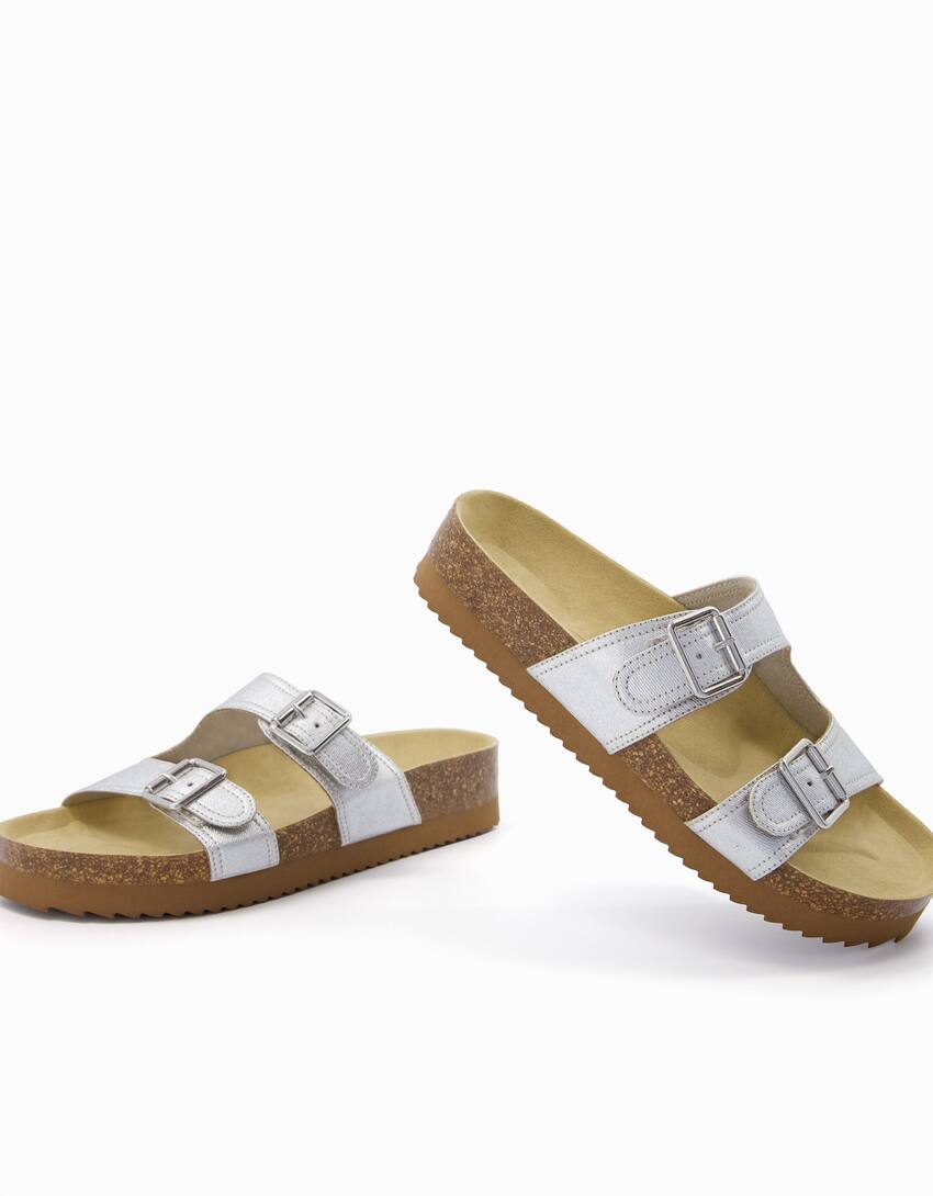 Metallic flat slider sandals with buckles - Women | Bershka